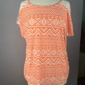 Sheer white and orange Aztec print shirt.